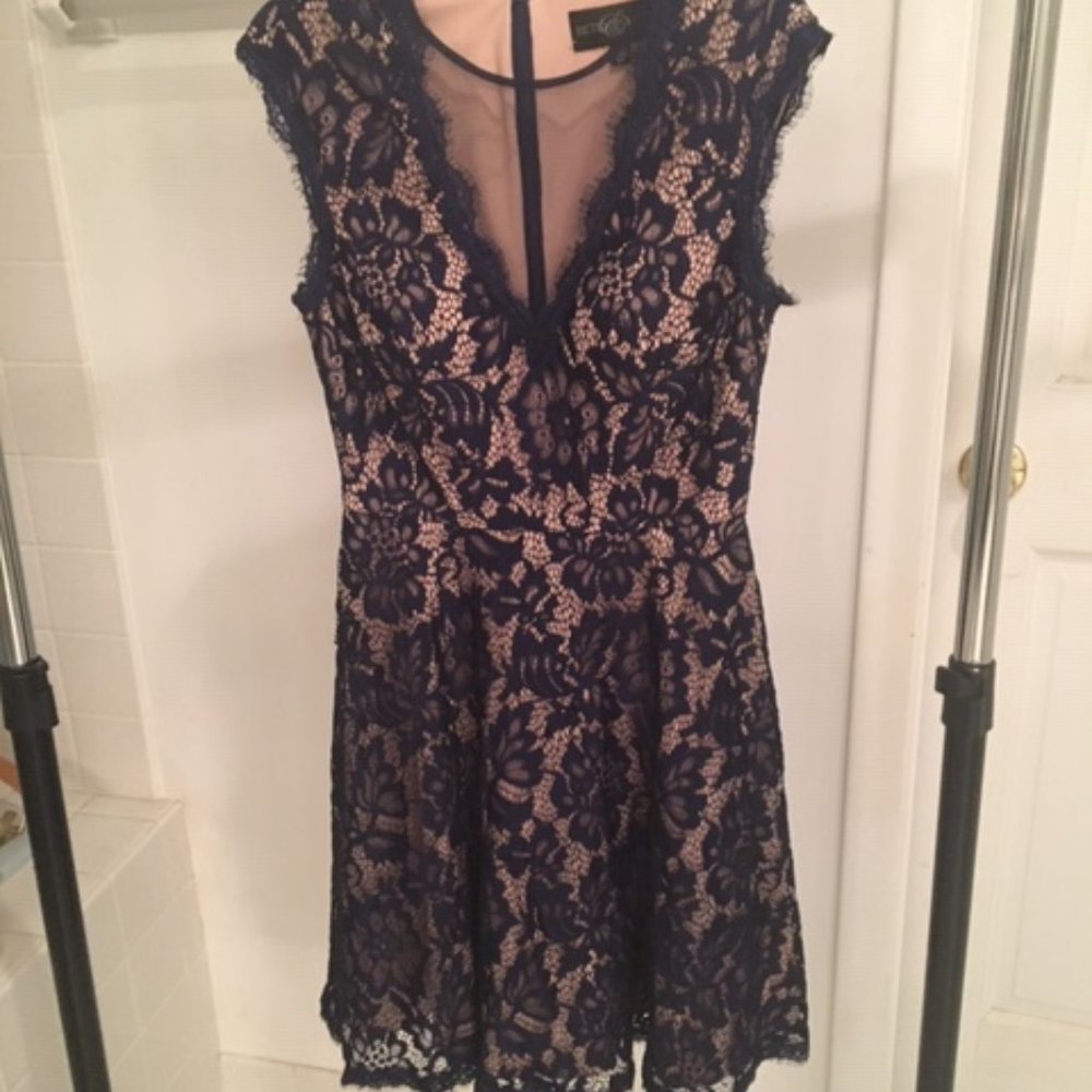 Flirty, shapely, black lacy dress